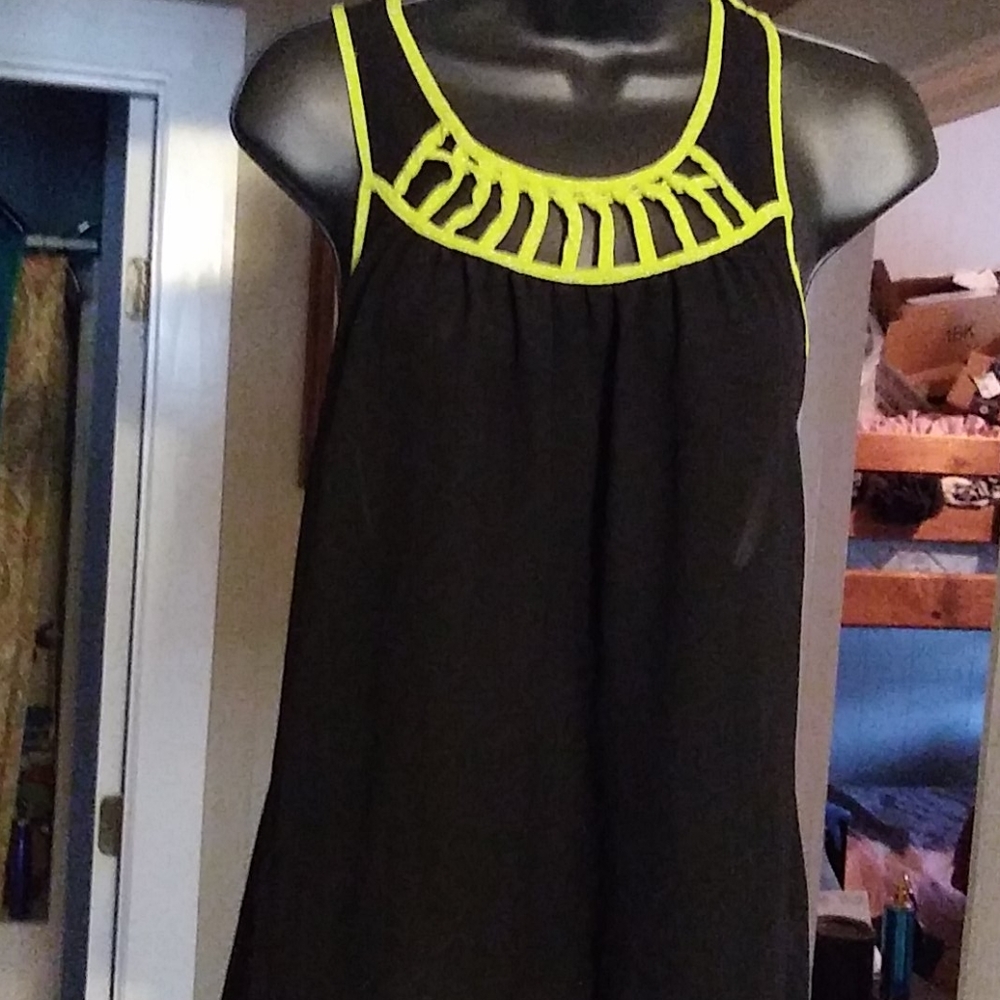 Green and black sleeveless top lattice detail
